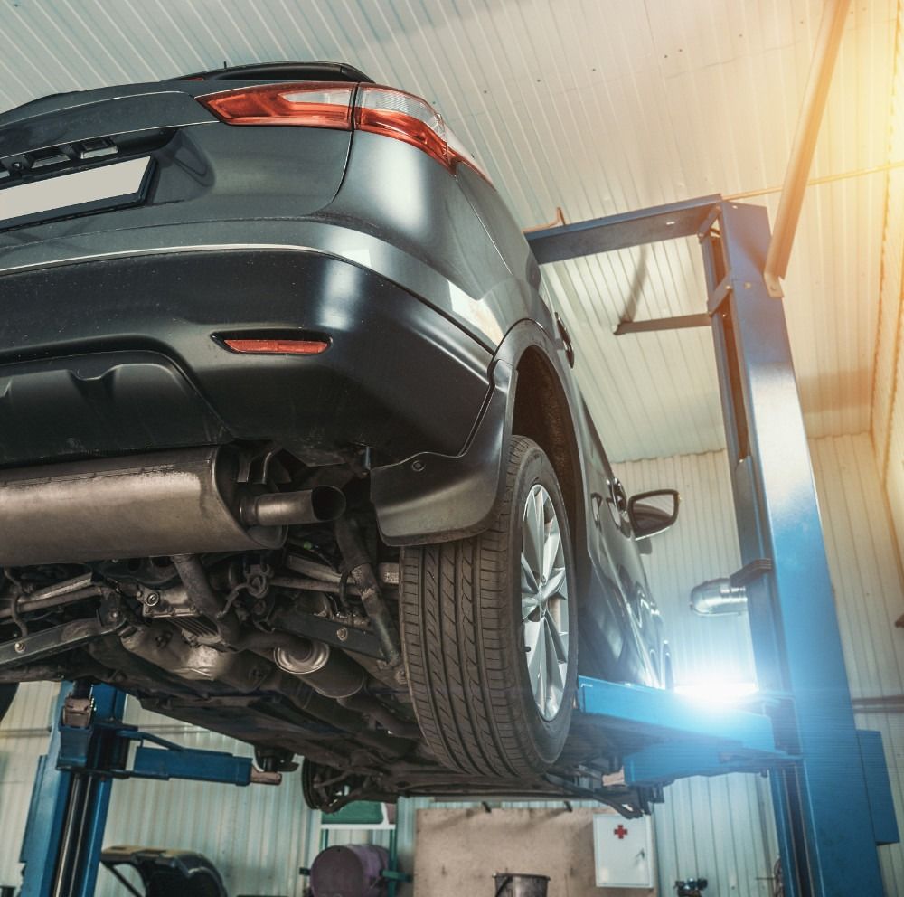 Vehicle on an MOT Ramp for its annual inspection - Colville Road MOT Centre - MOT, Tyres & Servicing in Lowestoft